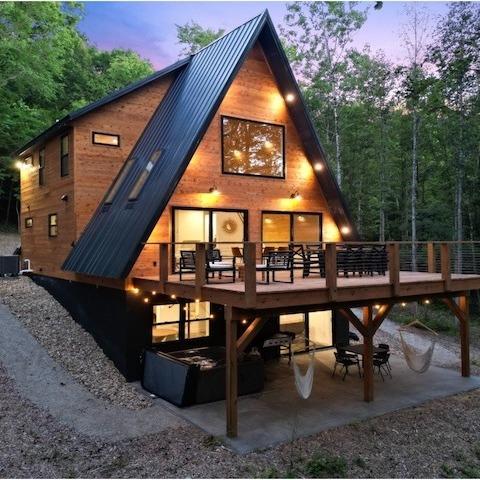 The Redhawk cabin with an A-frame design and spacious deck in Logan, Ohio
